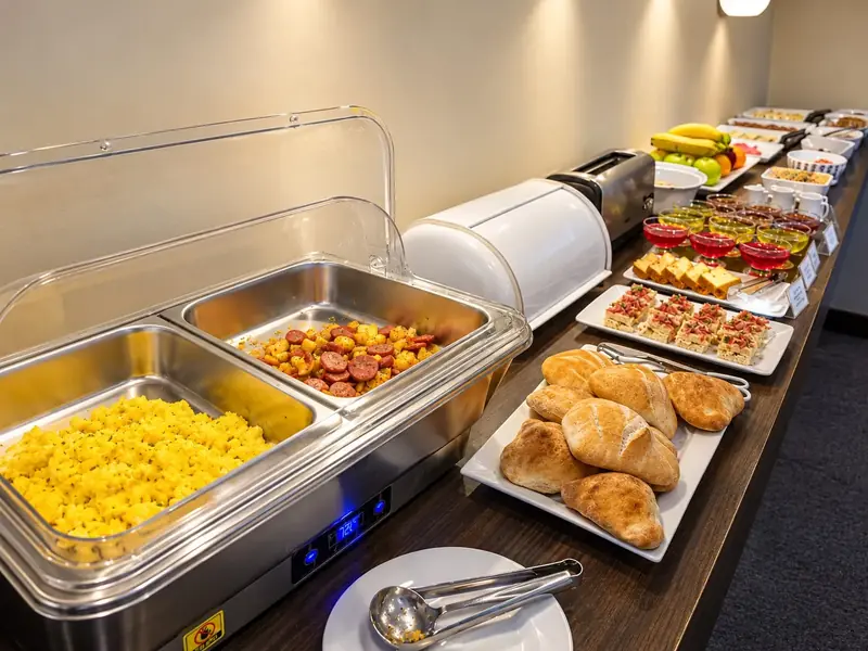 Breakfast buffet with bread and hot dishes