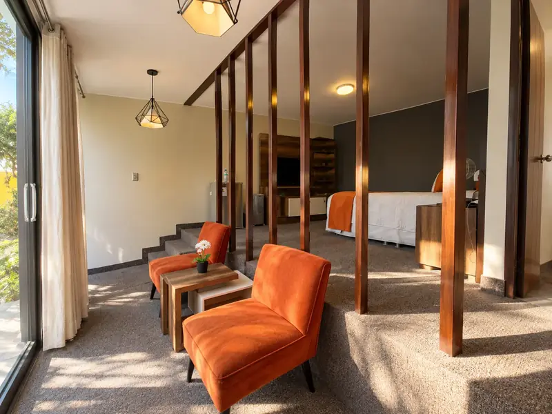 The Semi Suite’s lounge with armchairs