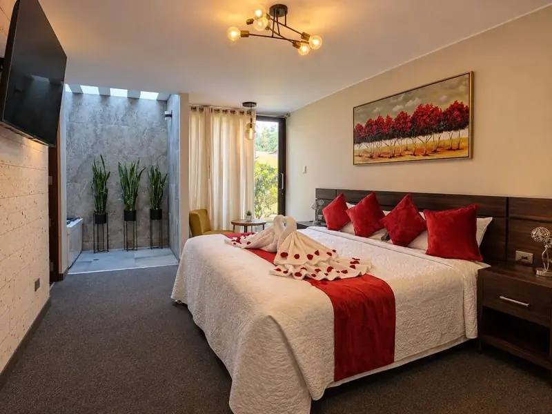 Suite with king-size bed and welcome touches